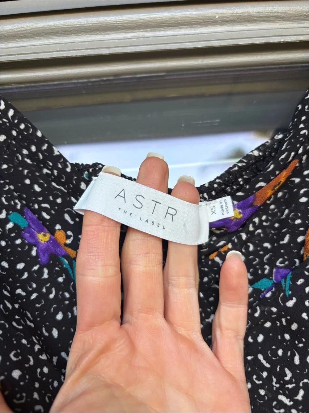 Astr Black Floral V-Neck Long Sleeve Blouse with Orange and Purple Accents